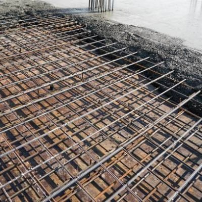 Construction of a new residential complex. Pouring concrete on the floor.